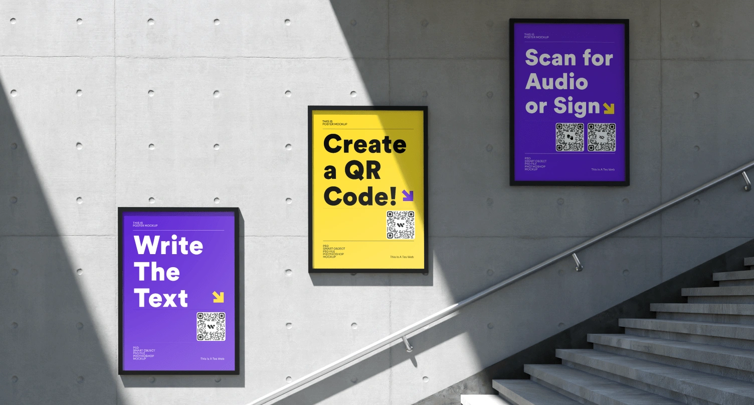 The image shows three posters on a concrete wall with a staircase; one poster says Write The Text, another says Create a QR Code! and the third says Scan for Audio or Sign.