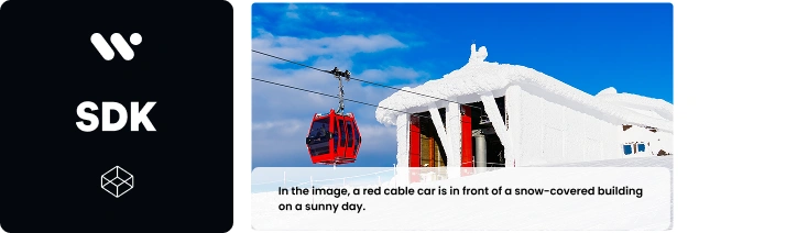 The image shows a red cable car in front of a snow-covered building on a sunny day, with the text SDK and a small icon on the left side.